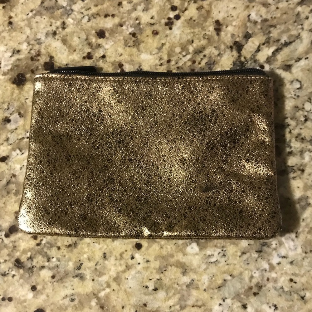 bareMinerals gold, shiny cosmetics bag / pouch